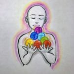 boy holding chakras