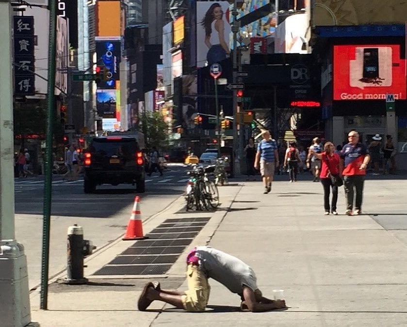 Only in #nyc I could see someone #praying in the direction of #mecca on the #sidewalk. #faith #dedication