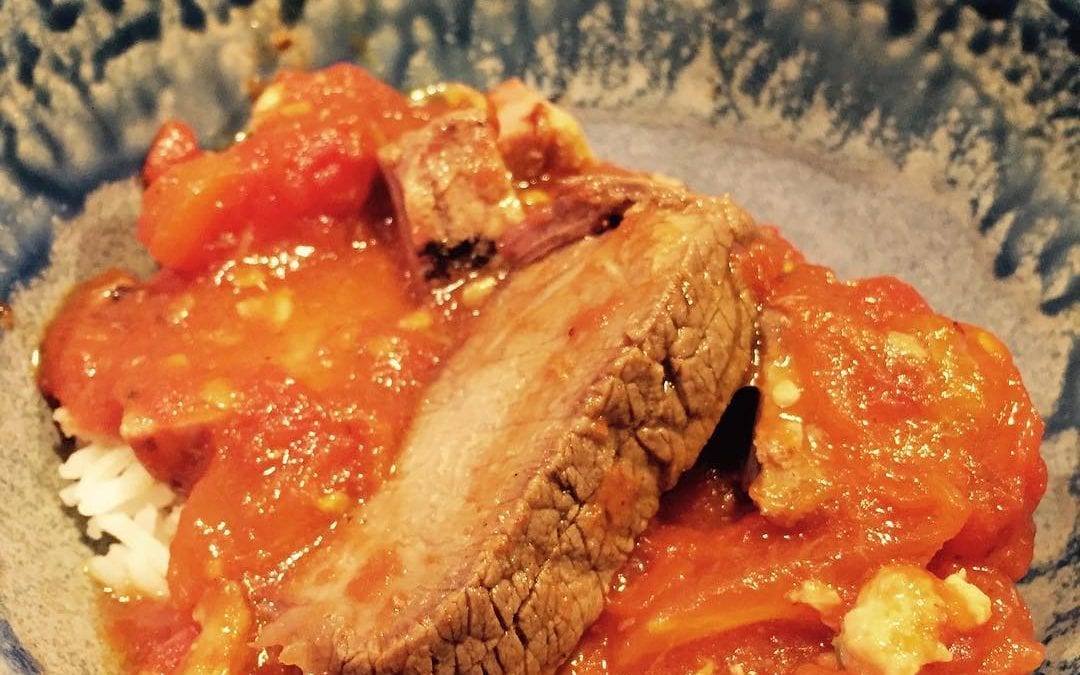 Fresh #tomato sauce & #beef and #blackbeansauce over rice #asian