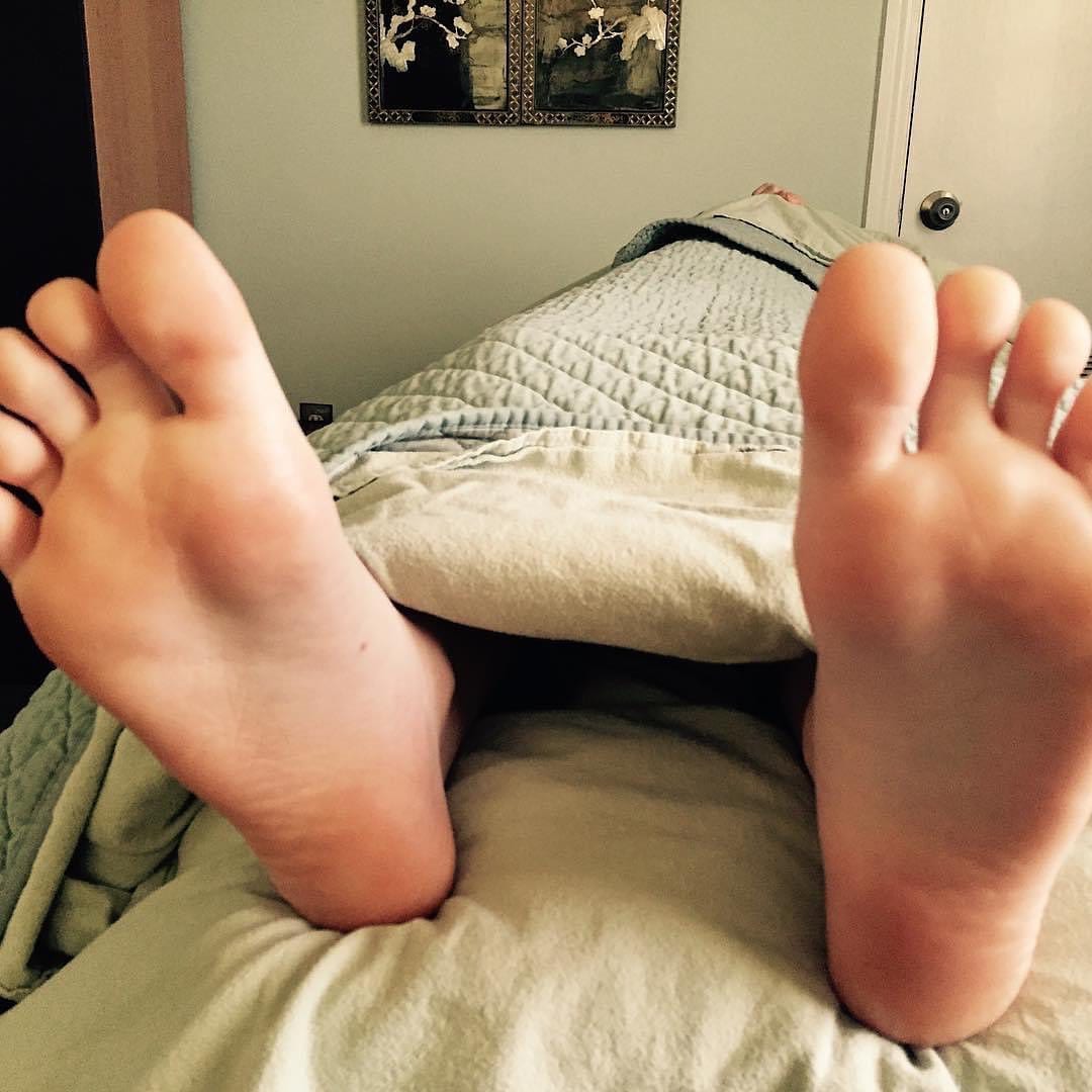 naked feet on table